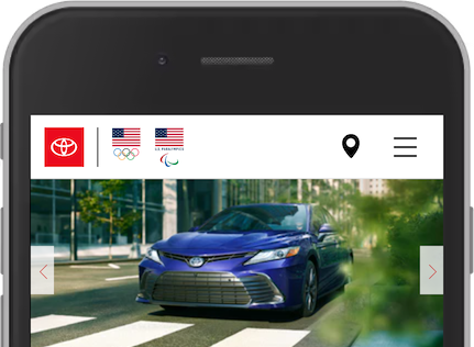 Screenshot from the Toyota web site on a mobile device. Showing a logo, one location icon, one hamburger icon and one carousel.